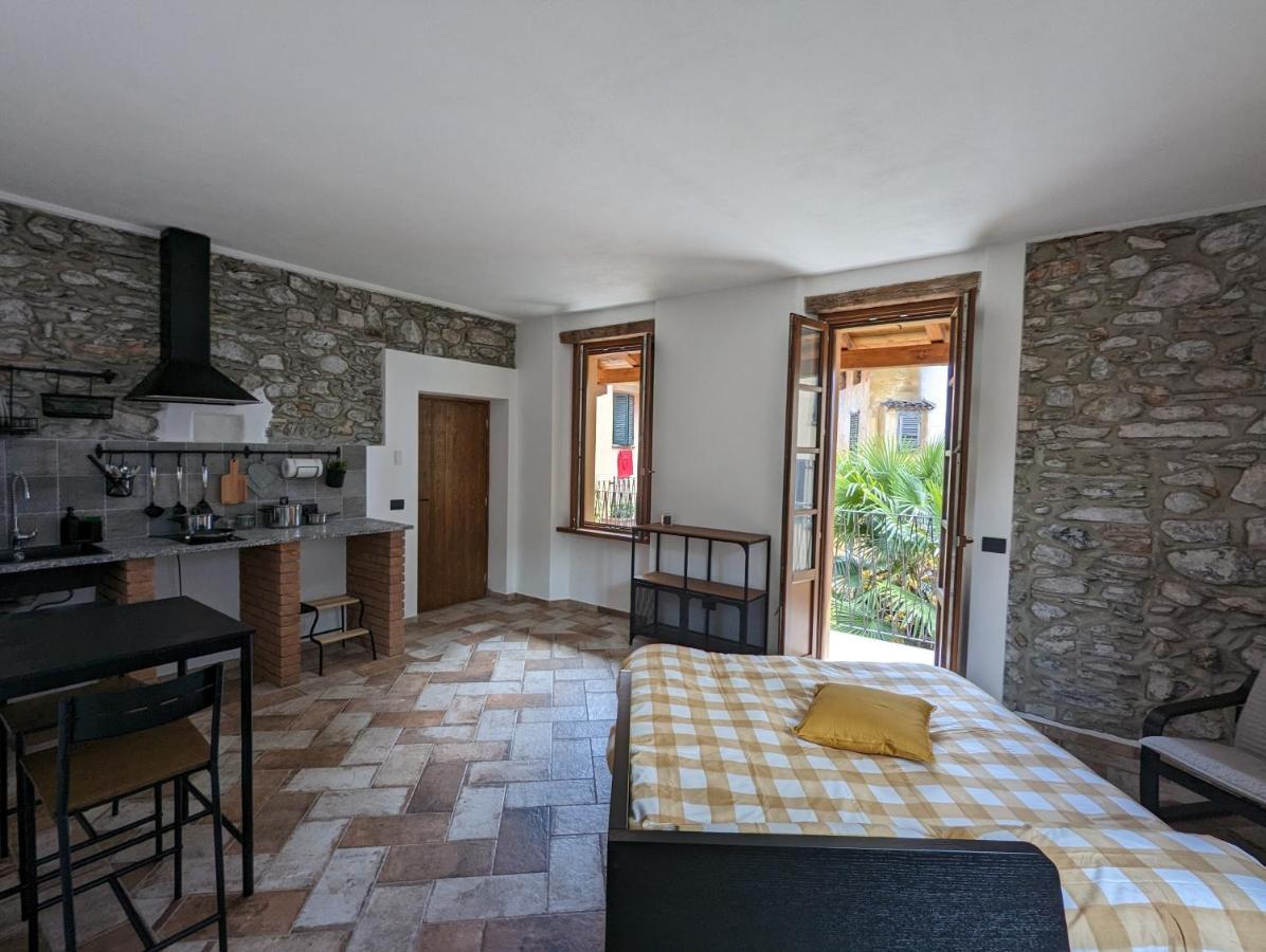Antica Osteria Apartments Dongo Bagian luar foto