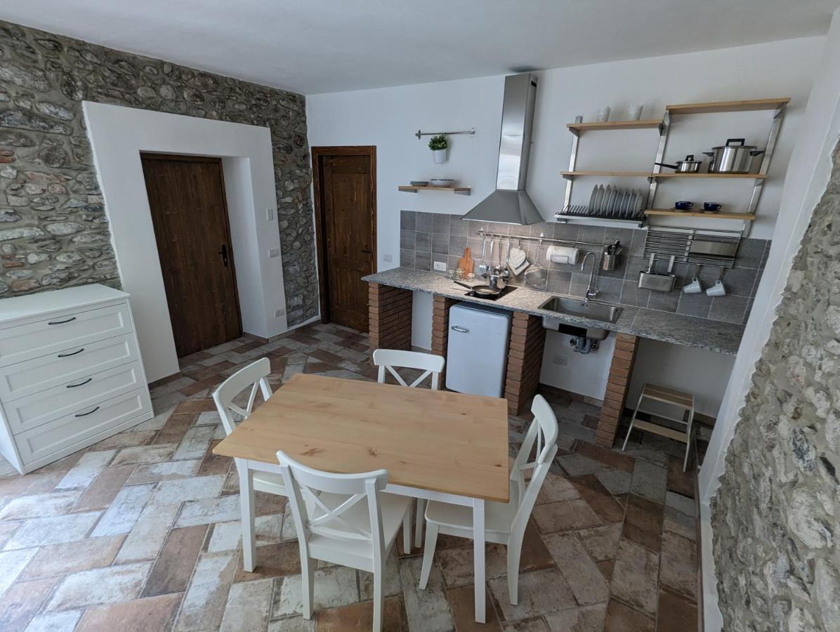Antica Osteria Apartments Dongo Ruang foto