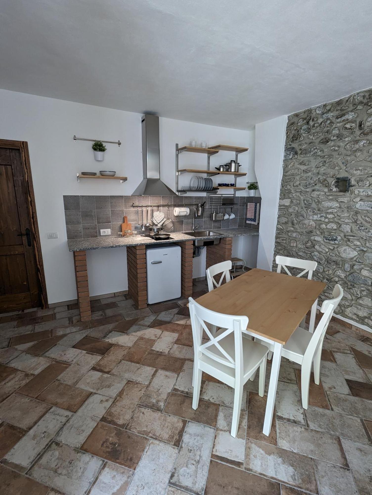 Antica Osteria Apartments Dongo Ruang foto